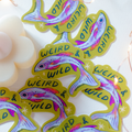 Stickers with fish design and 'Weird & Wild' text on a white background