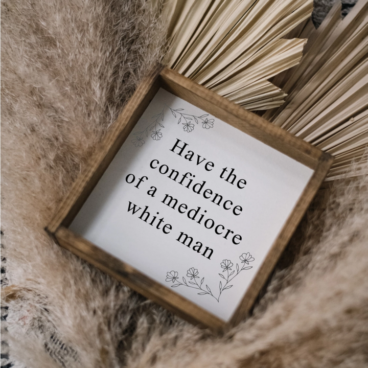 A framed print with the text 