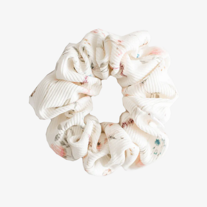 Butterflies and Wildflowers Petite Scunchie, a fluffy ribbed hair tie in white with small flowers and butterflies.