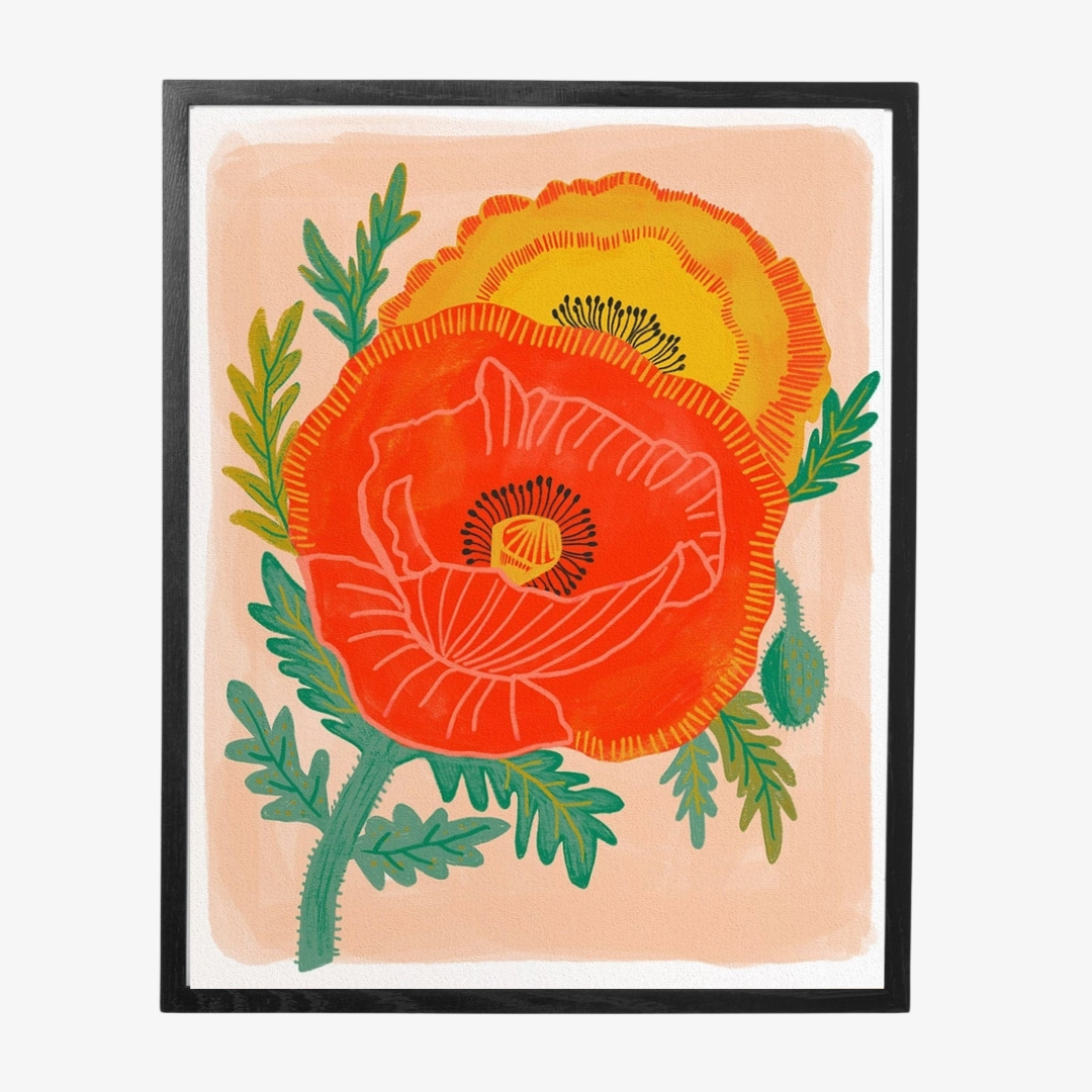 Poppy Garden Framed Art Print, a colourful art print of two bright poppies on a pink background, in a black frame.