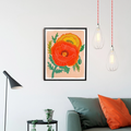 Poppy Garden Framed Art Print, a colourful art print of two bright poppies on a pink background, in a black frame.