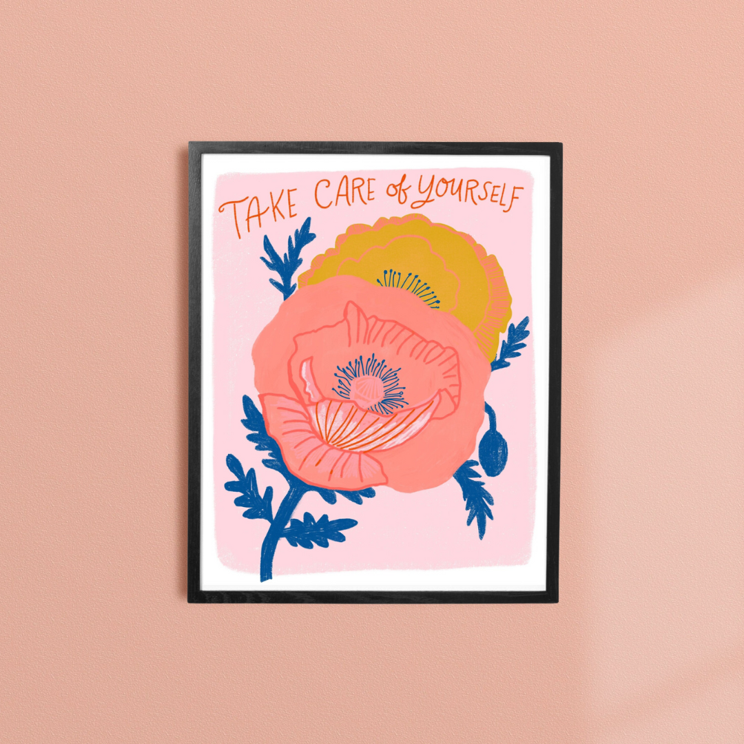 Take Care of Yourself Framed Art Print, an art print of two colourful flowers with the words "take care of yourself" above on a pink background, in a black frame.