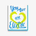 Electric Wedding Card, a white greeting card with the image of two electic eels in green that glow in the dark with the words "You two are electric"