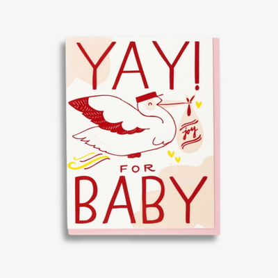 Red Yay Baby Card, a white greeting card with an image of a stock carrying a bag labeled joy, with the words 