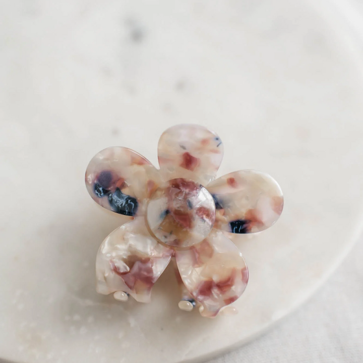 Spring Splash Floral Clip, floral hair clips with a vibrant mix of pink, white, and blue resin petals. The petals have a marbled effect.