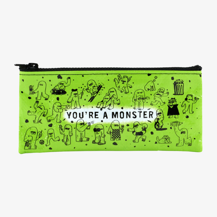 A bright green pencil case with a playful design. The case is covered in small black monster illustrations and the phrase 