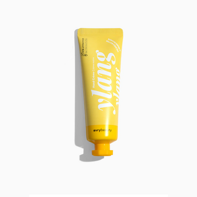 Ylang Ylang Shea Butter Lotion, a hand and body lotion in a colourful tube.