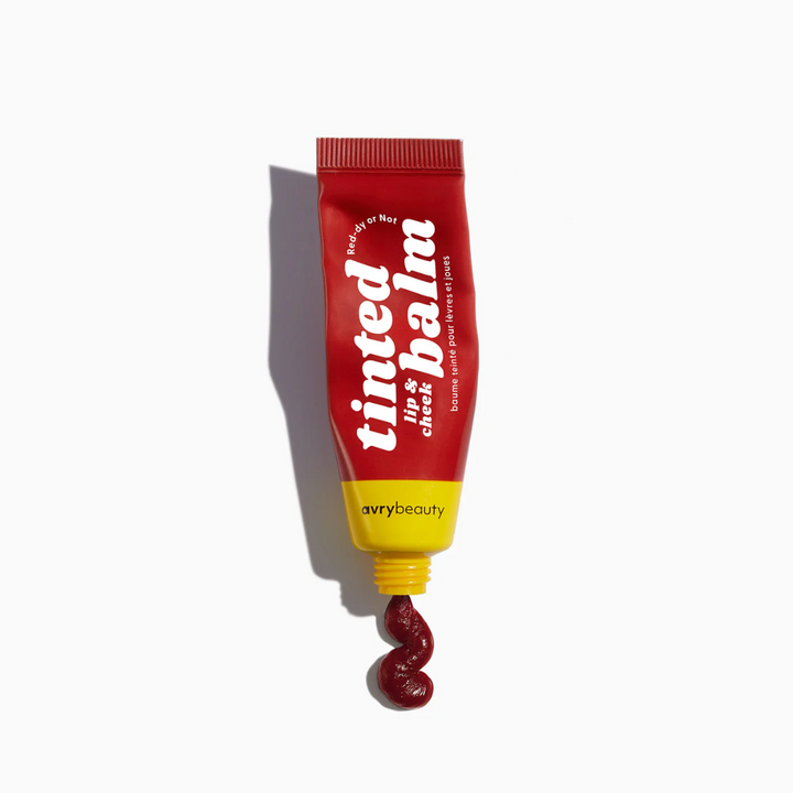 Red-dy or Not Lip & Cheek Tinted Balm, a liquid blush that can be used for your eyes, cheeks and lips, in a colourful squeeze tube.