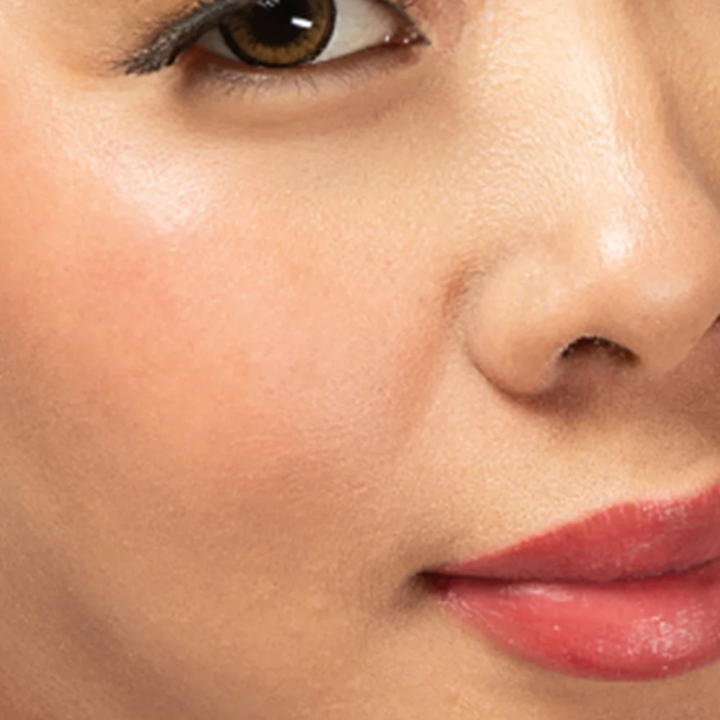 Red-dy or Not Lip & Cheek Tinted Balm, a liquid blush used on a asian woman's eyes, cheeks and lips.