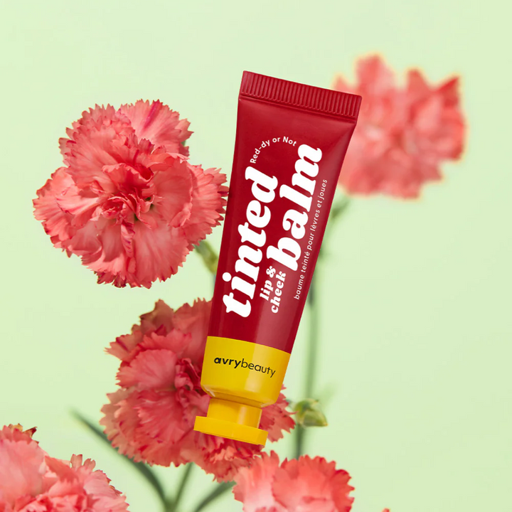 Red-dy or Not Lip & Cheek Tinted Balm, a liquid blush that can be used for your eyes, cheeks and lips, in a colourful squeeze tube.