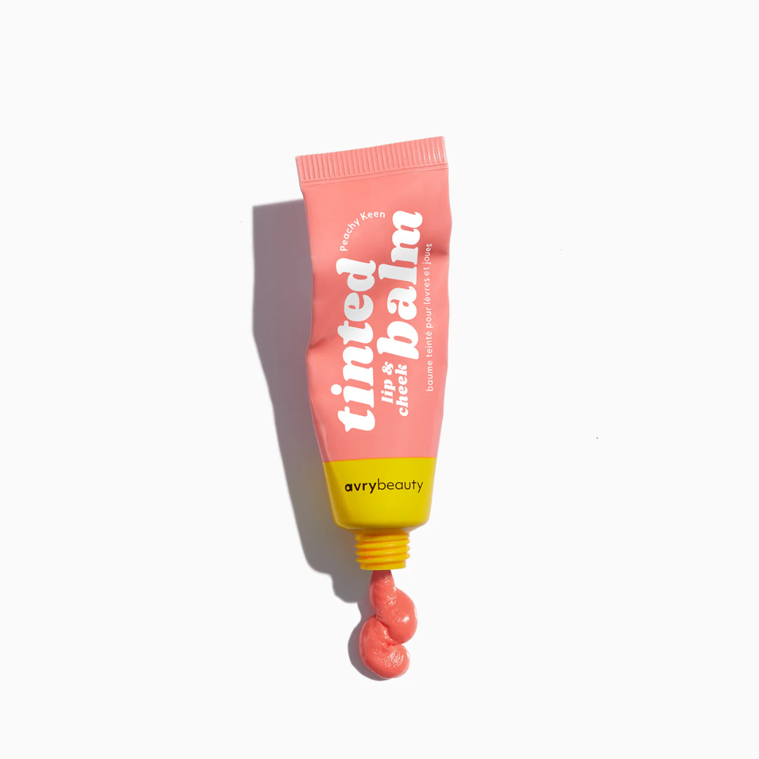 Peachy Keen Lip & Cheek Tinted Balm, a liquid blush that can be used for your eyes, cheeks and lips, in a colourful squeeze tube.