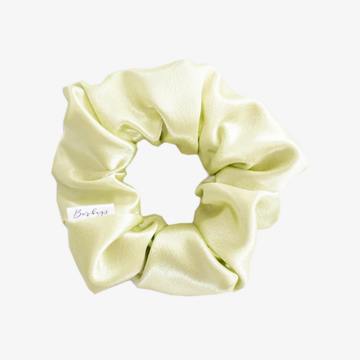 Chili Lime Satin Petite Scunchie, a fluffy satin scrunchie in a pastel green colour.