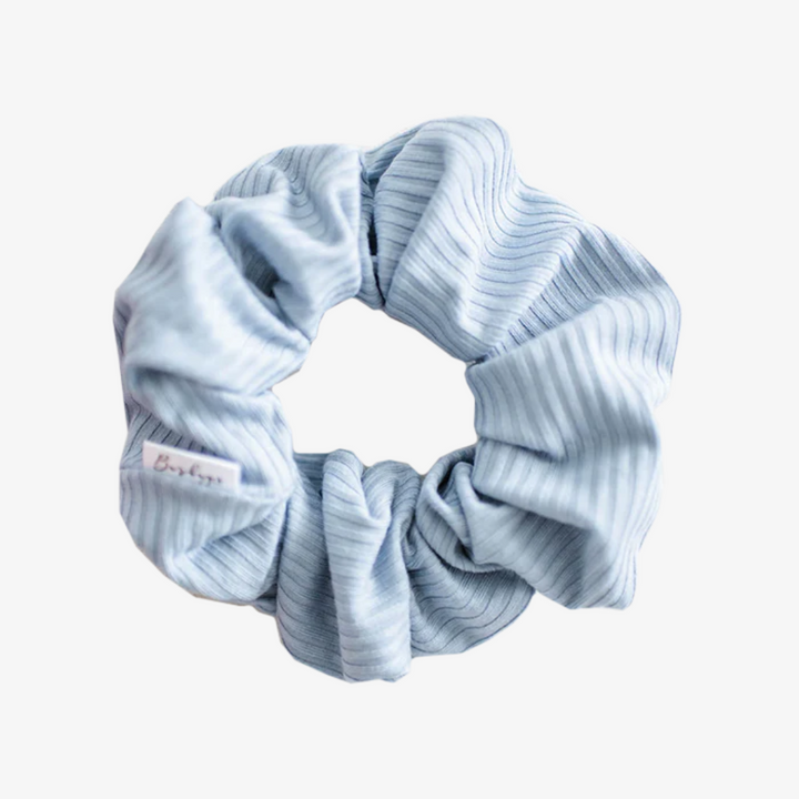 Baby Blue Rib Knit Petite Scunchie, a fluffy hair tie in a baby blue ribbed knit.