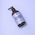 An amber plastic pump bottle of Epic Blend Blackberry Bubblegum Hand Wash with a light purple label. The label specifies "blackberry bubblegum + chamomile extract" and "hand wash".