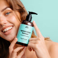 An amber plastic pump bottle of Epic Blend Spearmint Lemon Hand Wash with a light blue label. The label specifies "spearmint lemon + chamomile extract" and "hand wash".