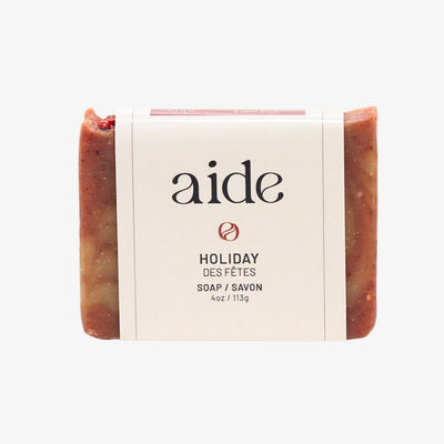 Bar of soap with 'aide' branding on a white background
