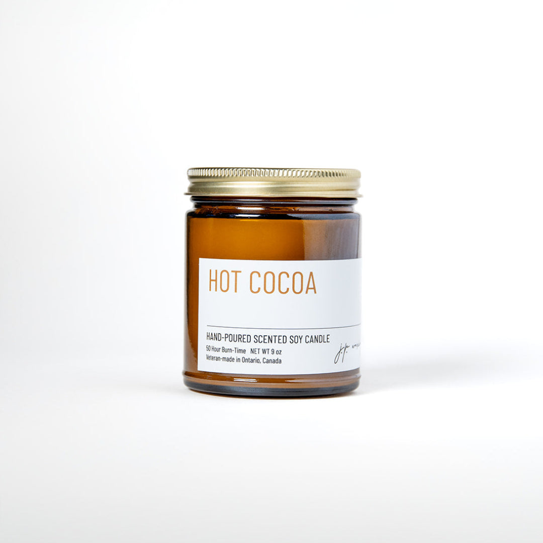Candle jar labeled 'Hot Cocoa' on a white background