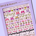 A sheet of cowboy-themed nail art stickers. The sheet is purple and has the brand name "Deco Beauty" printed on it. There's a section titled "Howdy" and instructions on how to apply the stickers. The stickers include various cowboy-themed designs like boots, horseshoes, stars, and butterflies.