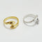 A set of gold and silver hug rings, each featuring two hands gently wrapping around the finger, symbolizing love, friendship, and support. These open band rings are available in Ottawa, Ontario, Canada.