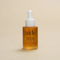 Aide Bodycare Hydrating Face Serum, featuring a small glass bottle with a dropper and a label with 'aide' logo, 'Hydrating Face Serum', and 'neroli & geranium' text, displayed on a light-colored surface. The serum is natural and available in Ottawa, Ontario, Canada.