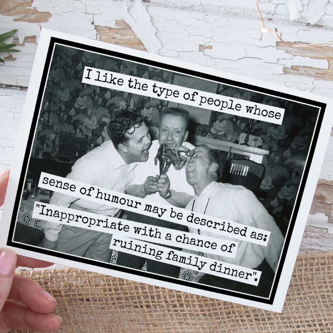 Black and white photo of two men eating pizza with humorous text overlay on a textured surface.