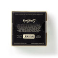 The back of a Brass Monkey product box, featuring the brand name in white script, a trivia description, a barcode, and ISBN details, set against a plain white background.