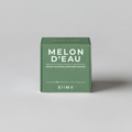 Green box of Melon d'Eau soap on a gray background