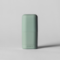 Green cylindrical container with 'Zomia' branding on a light gray background