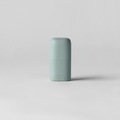 Cylindrical light blue object on a white background