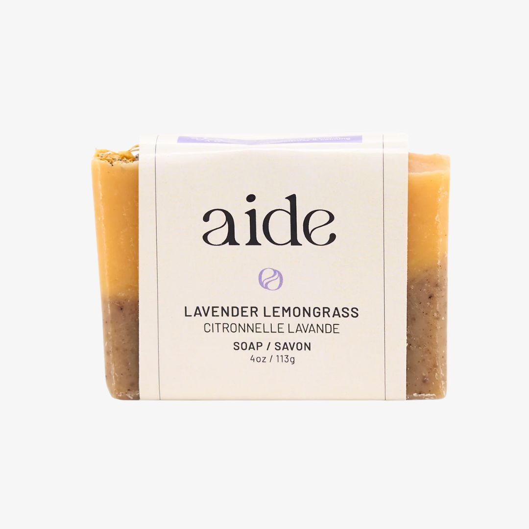 Bar of soap with 'aide' branding on a white background