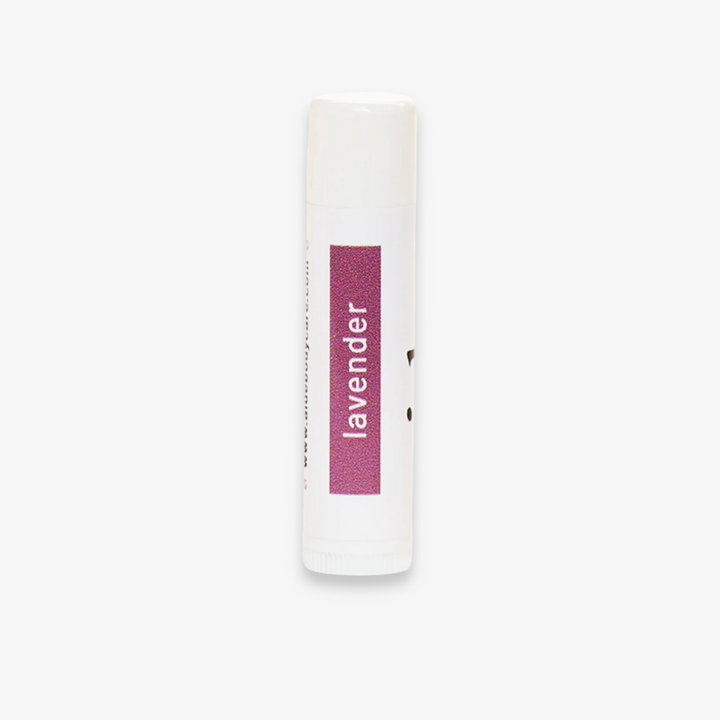 A white tube of lip balm with the word 
