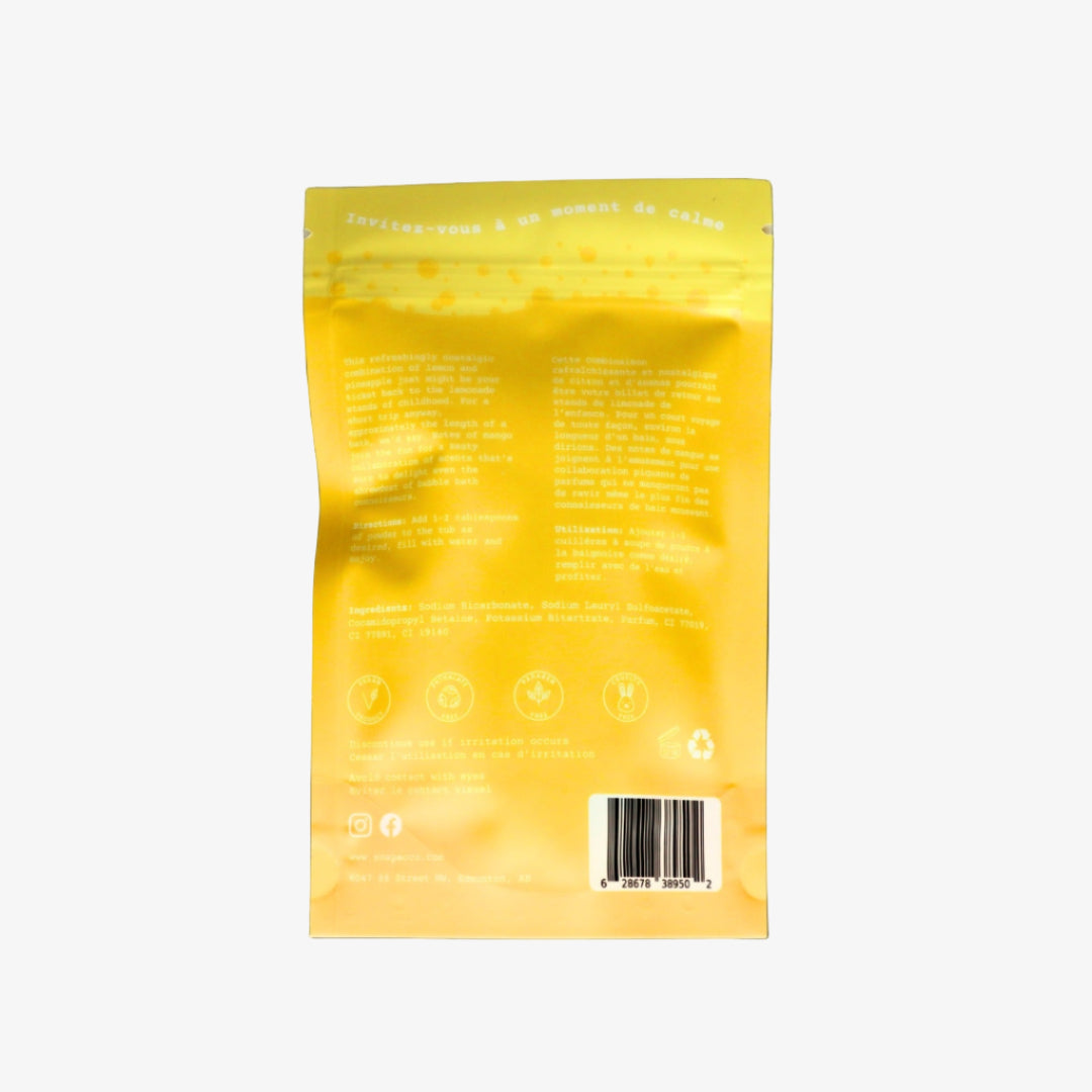 Yellow packaging with text and a barcode on a black background