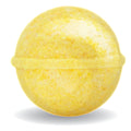 Yellow bath bomb on a white background