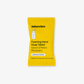 Yellow package of naturebee foaming hand soap tablet on a white background