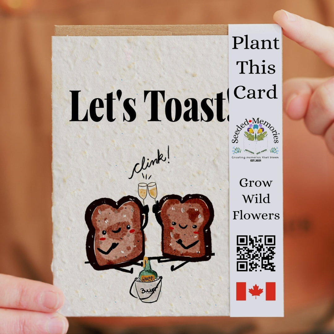 Seeded paper card with toast illustrations and 'Let's Toast' text, held by a hand.