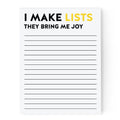 Notepad with text 'I MAKE LISTS THEY BRING ME JOY' and lined pages on a white background