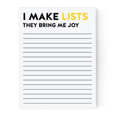 Notepad with text 'I MAKE LISTS THEY BRING ME JOY' and lined pages on a white background