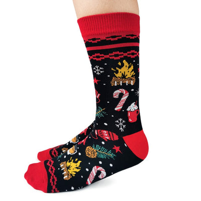 Christmas-themed socks with red cuffs and toes on a white background