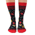 Colorful socks with space-themed design on a white background