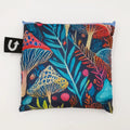 A colorful tote bag with a psychedelic mushroom and plant pattern. The bag has a dark blue background with bright, vibrant colors.