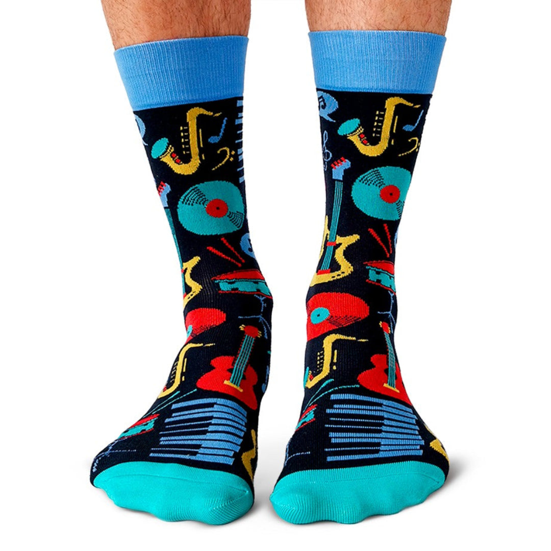 Colorful socks with musical instrument pattern on a white background