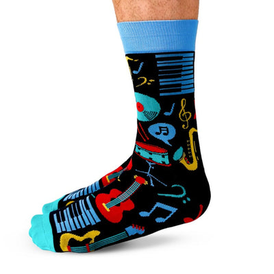 Colorful sock with musical instrument design on a white background