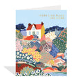 Colorful greeting card with a house and nature design, featuring the text 'There's no place like home'.