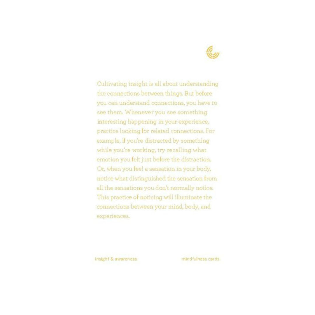 A minimalist white card featuring a small gold crescent moon at the top right and a block of gold text in the center, with 'insight & awareness' and 'matchless cards' printed in small gold text at the bottom.