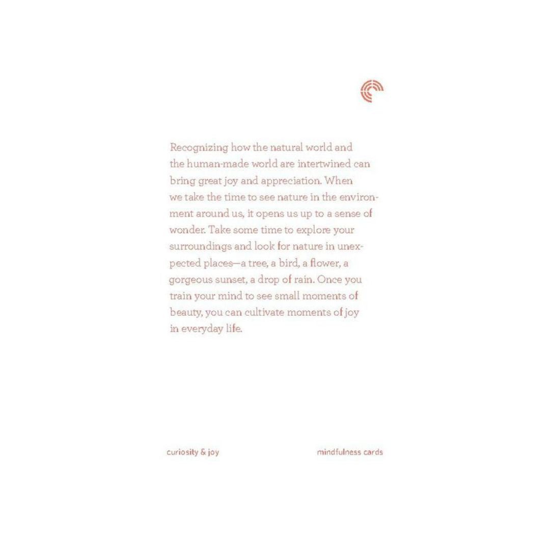 A minimalist card with a warm off-white background featuring a short inspirational quote in a muted terracotta-brown serif font. A small matching terracotta crescent moon graphic appears in the upper right, and the bottom includes the text 'curiosity & joy' and 'mindfulness cards'.