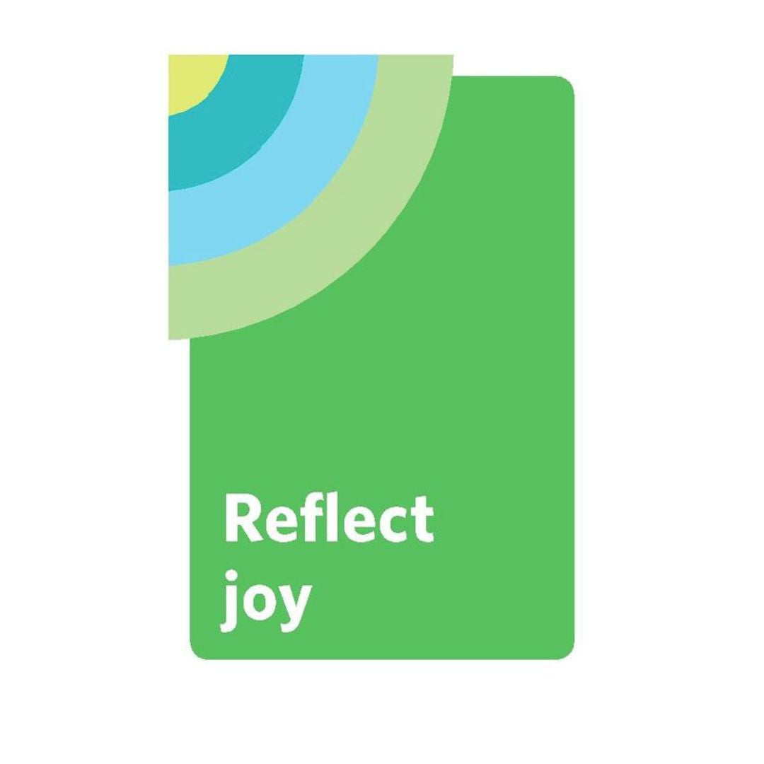 A green rectangular card or label with rounded corners, featuring the words 'Reflect joy' in white lowercase text and an abstract curved stripe design in yellow, light green, light blue, and teal near the top left, shown on a white background.