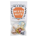 A clear plastic package containing six buttons with a "Mixed Nuts" theme. The header card reads "The Regional Assembly of Text PACK OF BUTTONS" and features a shield with "MIXED NUTS" inside, and "TO WEAR AND SHARE" below. Visible buttons include a squirrel, a jar of peanut butter, and two nuts and bolts designs.