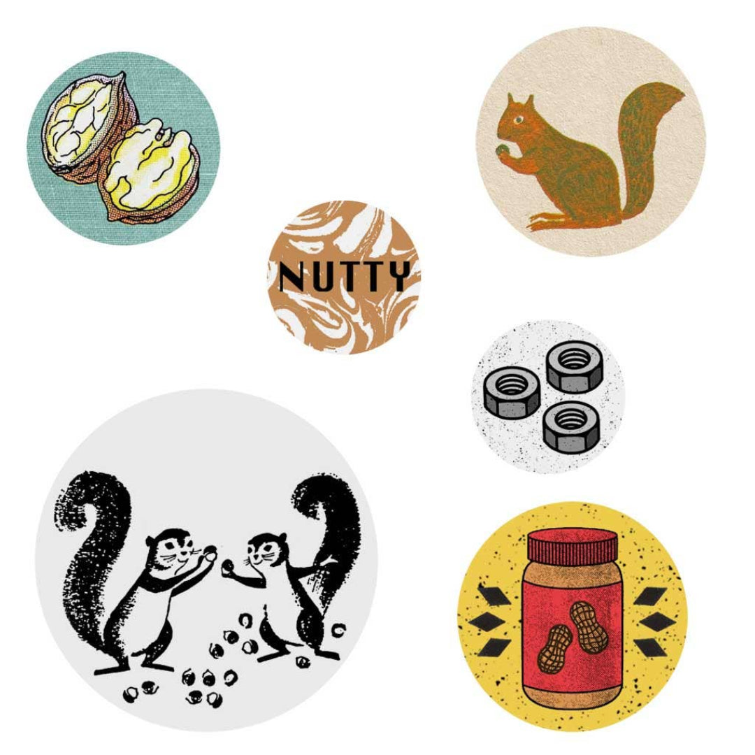A clear plastic package containing six buttons with a "Mixed Nuts" theme. The header card reads "The Regional Assembly of Text PACK OF BUTTONS" and features a shield with "MIXED NUTS" inside, and "TO WEAR AND SHARE" below. Visible buttons include a squirrel, a jar of peanut butter, and two nuts and bolts designs.
