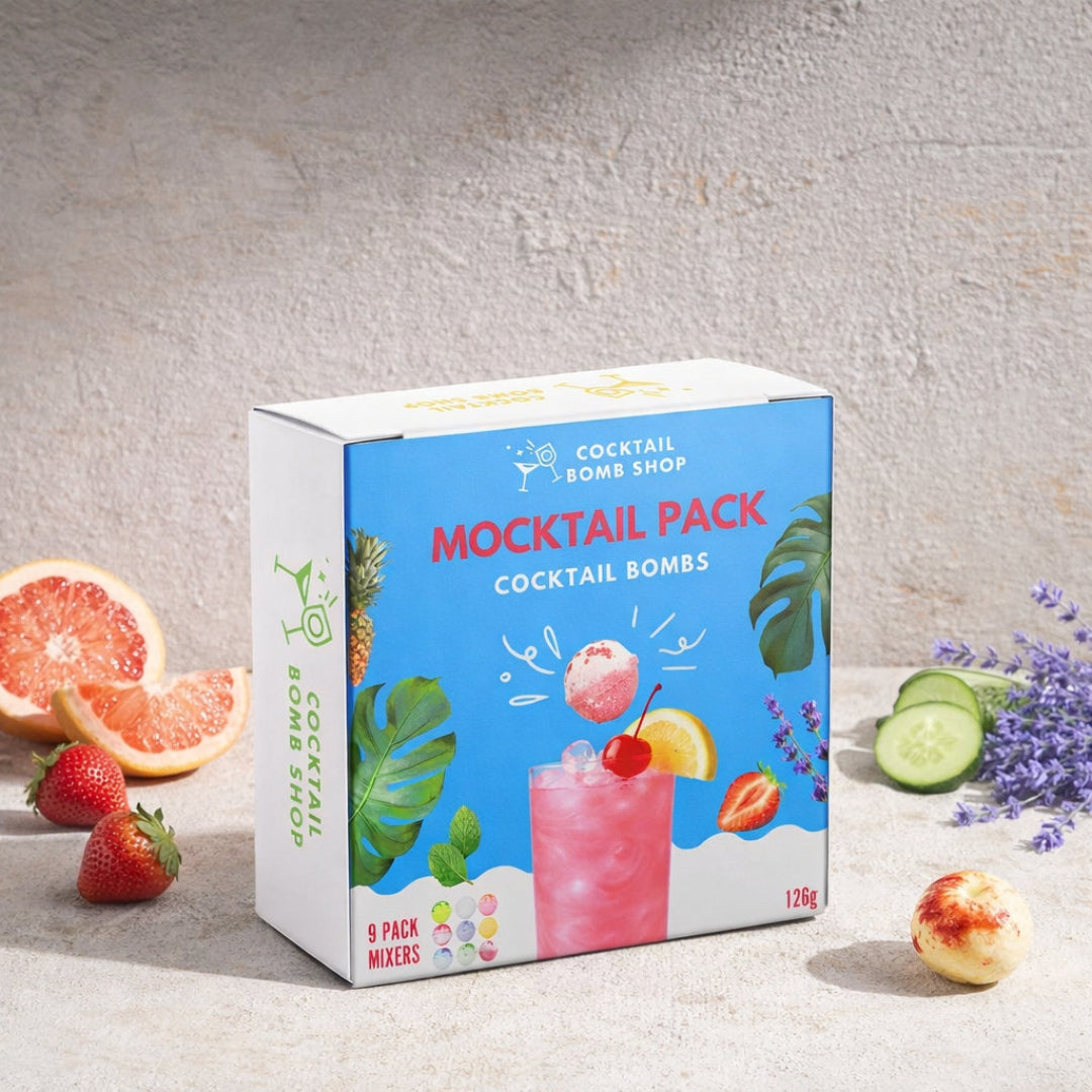 Box of Cocktail Bomb Shop mocktail pack with cocktail ingredients on a light background