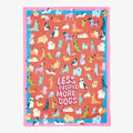 Colorful dish towel with dog pattern and 'Less People More Dogs' text on a white background